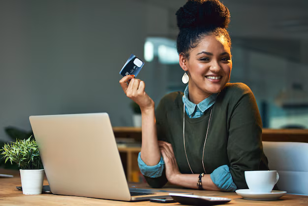 Image of a business owner using a payment terminal